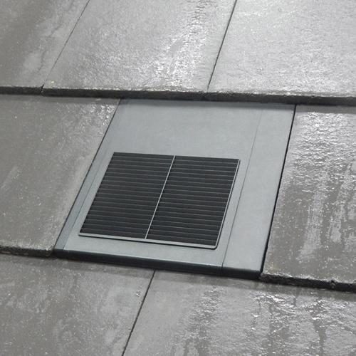 Roof vent on a tiled roof